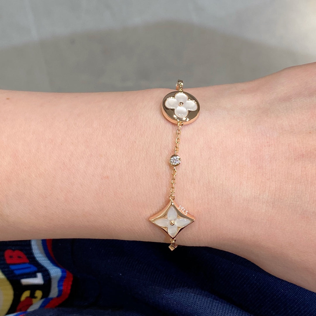 ¡®Lume Jewels¡¯STAR AND SUN 4 MOTIF WHITE MOP PINK GOLD BRACELET